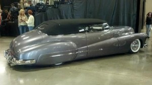 Gray classic car at an auction.