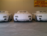 three wrapped cars